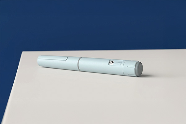 wegovy 7.2 mg dose | wegovy weight loss injection pen on table with blue background