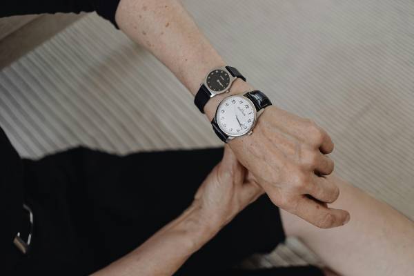 best time to take wegovy | hand and arm with two watches
